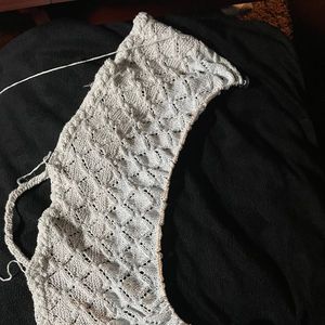 Pullover Schapulero mit Loch- und Zopfmuster